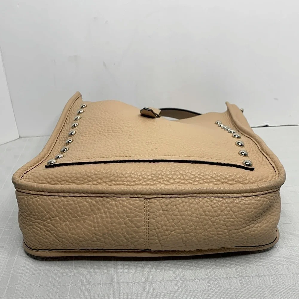 Rebecca Minkoff pebbled leather feed bag.